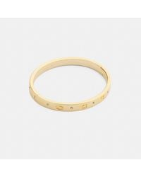 COACH - Repeated C Hinged Bangle - Lyst