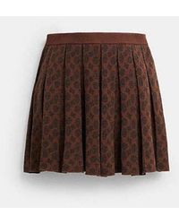 COACH - Signature Pleated Knit Mini Skirt - Lyst
