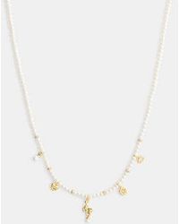 COACH - Mini Cat Pearl Charms Necklace - Lyst
