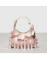 COACH - Ergo Bag In Topia Leather: Bows All Over - Lyst