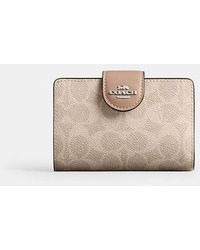 COACH - Medium Corner Zip Wallet In Signature Canvas - Lyst