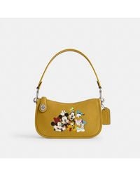 COACH - Disney X Swinger Bag In Regenerative Leather With Mickey Mouse And Friends - Lyst