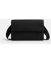 COACH - Turner Flap Crossbody Bag - Lyst