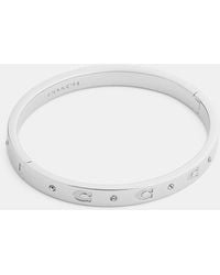 COACH - Repeated C Hinged Bangle Bracelet - Lyst