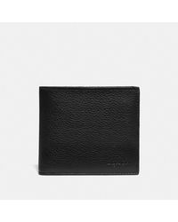 COACH Portafoglio porta banconote a doppio scomparto con blocchi in tela Signature - Nero