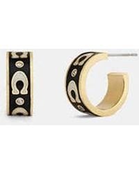 COACH - Repeated C Huggie Earrings - Lyst