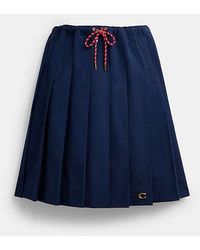 COACH - Sporty Pleated Midi Skirt - Lyst
