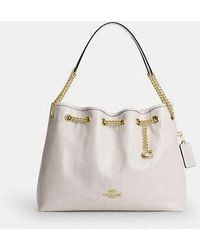 COACH - Evelyn Shoulder Bag With Quilting And Charm - Lyst