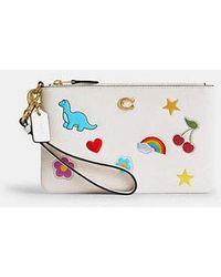 COACH - Essential Small Wristlet With Sticker Print - Lyst