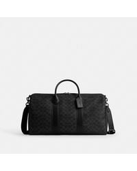 COACH - Compass Bag 50 - Lyst