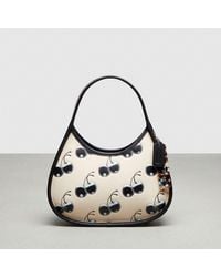 COACH - Ergo Bag In Topia Leather With Cherry Print - Lyst