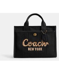 COACH - New Year Cargo Tote Bag With Coach Snake Script - Lyst