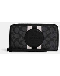 COACH - Dempsey Large Phone Wallet In Signature Jacquard With Stripe And Coach Patch - Lyst