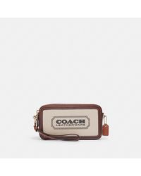 coach aster crossbody with floral frame