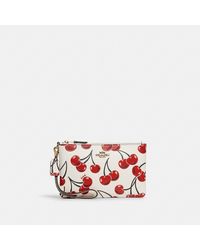 cherry print coach purse