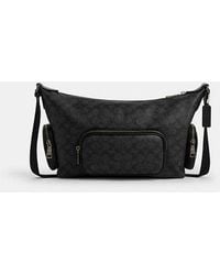 COACH - Finn Crossbody Bag With Pockets - Lyst