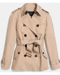 Women's COACH Raincoats and trench coats from $348 | Lyst