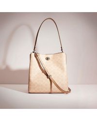 charlie bucket bolsa 21 in blocked signature canvas