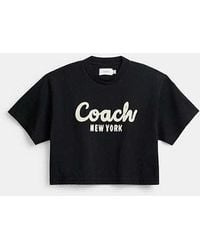 COACH - Verkürztes T-Shirt mit kursiver Signature - Lyst