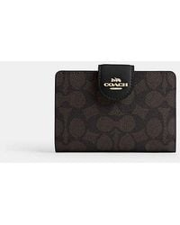 COACH - Medium Corner Zip Wallet In Signature Canvas - Lyst