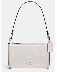COACH - Pouch Bag With Signature Canvas - Lyst