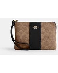 COACH - Signature Canvas Wristlet Clutch - Lyst