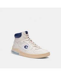 coach high top button up sneaker