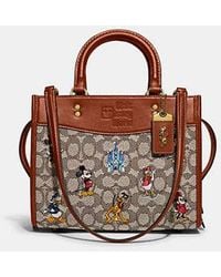 COACH - Disney X Coach Rogue Bag 25 In Signature Textile Jacquard With Mickey Mouse And Friends Embroidery - Lyst