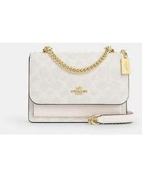 COACH - Mini Klare Crossbody Bag In Signature Canvas - Lyst