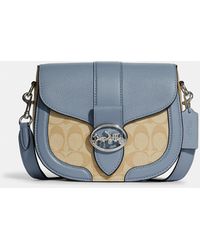 georgie saddle bolsa in colorblock signature canvas with rivets