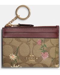 Coach Outlet Small Wristlet With Floral Print - ShopStyle Wallets & Card  Holders