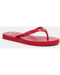 coach flip flops red