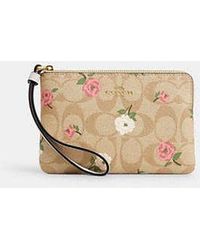 COACH - Corner Zip Wristlet In Signature Canvas With Floral Print - Lyst