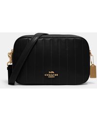 klare crossbody in blocked signature
