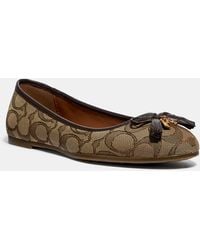 coach signature flats