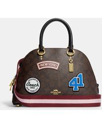 Coach Outlet Pepper Satchel In Signature Canvas in Black | Lyst