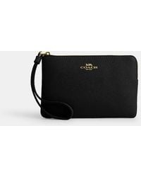 COACH - Corner Zip Wristlet - Lyst
