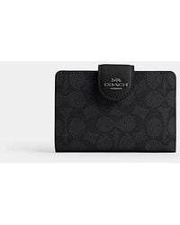 COACH - Medium Corner Zip Wallet In Signature Canvas - Lyst