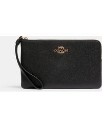 COACH - Large Corner Zip Wristlet - Lyst