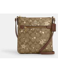 COACH - Mini Rowan File Bag In Signature Canvas With Star And Snowflake Print - Lyst