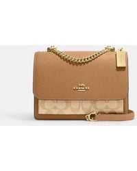 COACH® Outlet  Anna Foldover Crossbody Clutch In Signature Canvas