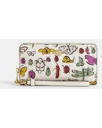 COACH - Long Zip Around Wallet With Creature Print - Lyst
