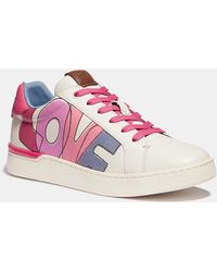 coach lowline low top sneaker in rainbow signature canvas