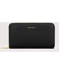 Coccinelle - Large Grainy Leather Zip-Around Purse Metallic Soft - Lyst