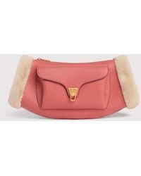 Coccinelle - Grained Leather Crossbody Bag With Synthetic Fur Hand-Warmers Beat Arctic - Lyst