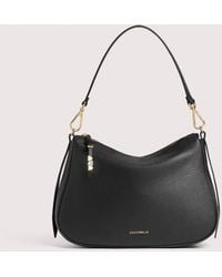Coccinelle - Grained Leather Hobo Bag Nory Small - Lyst