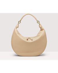 Coccinelle - Grainy Leather Shoulder Bag Maelody Medium - Lyst