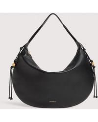 Coccinelle - Grained Leather Shoulder Bag Thess Large - Lyst