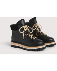 Coccinelle - Cowhide-Effect Smooth Leather And Synthetic Fur Ankle Boots Nora Bimaterial - Lyst