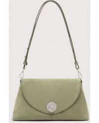 Coccinelle - Schultertasche Aus Wildleder Nikla Suede Bimaterial Medium - Lyst